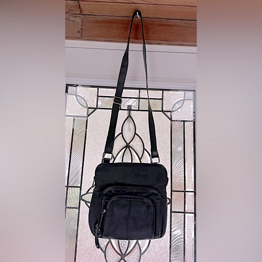 Danier Black Leather Crossbody Bag Sleek and Versatile